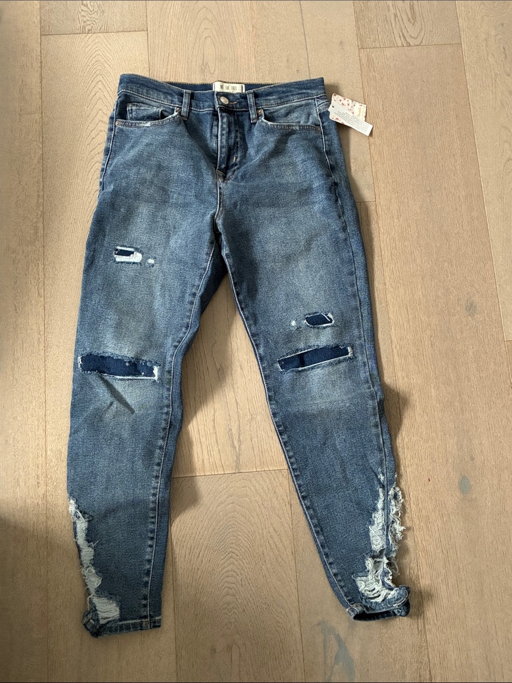 Free People Distressed Dark Blue Skinny Jeans with Frayed Ankles
